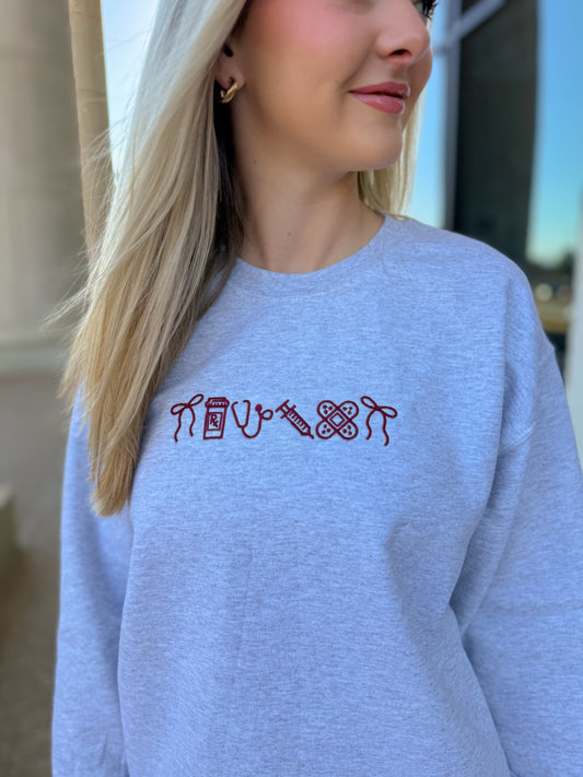 Nursing Emojis Embroidered Sweatshirt