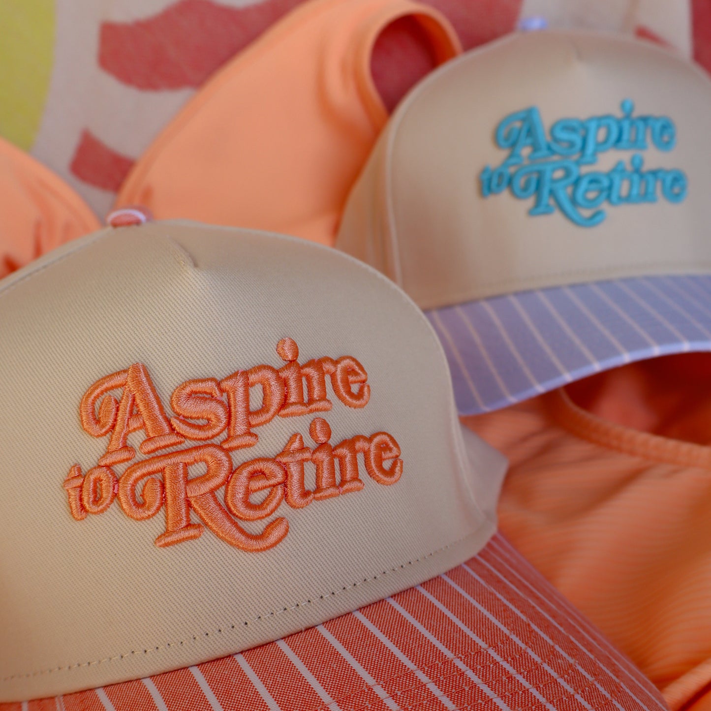 Aspire to Retire Embroidered Trucker Hat