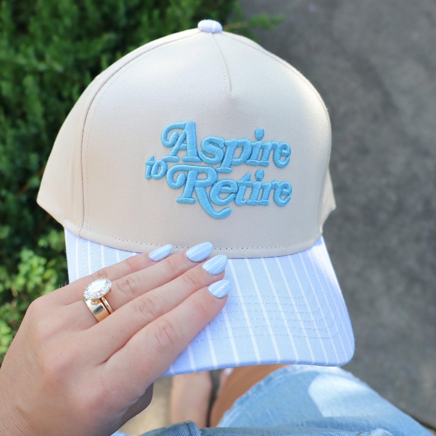 Aspire to Retire Embroidered Trucker Hat
